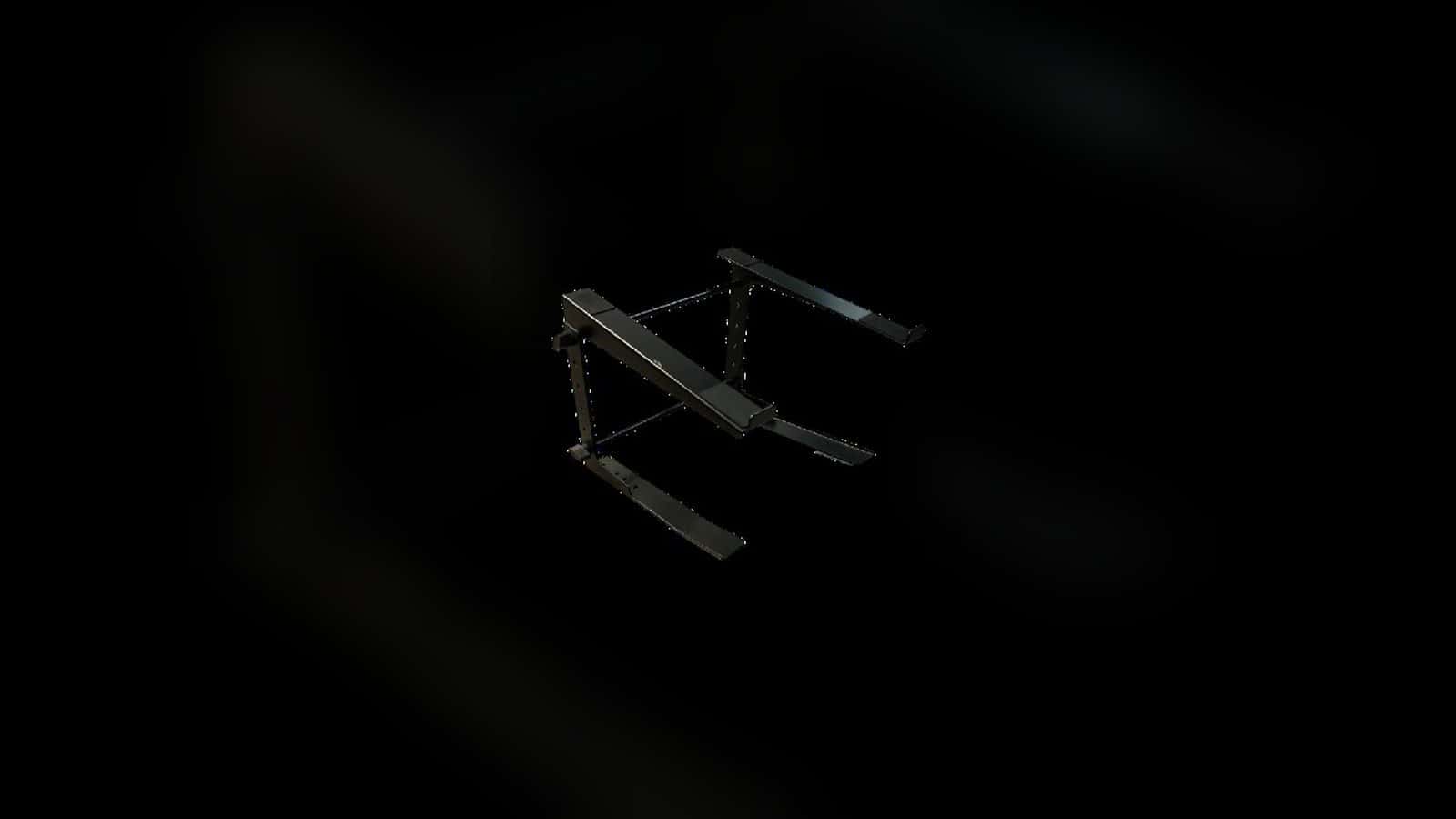 Black folding laptop stand shown as an isolated product
