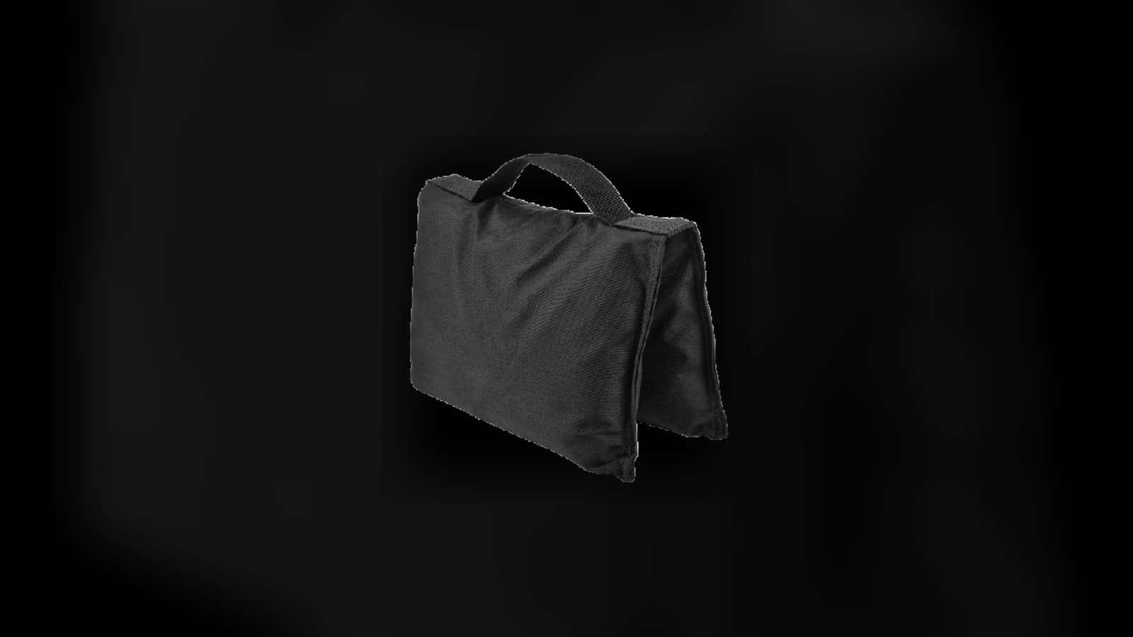Black handled sand weight shown as an isolated rental product