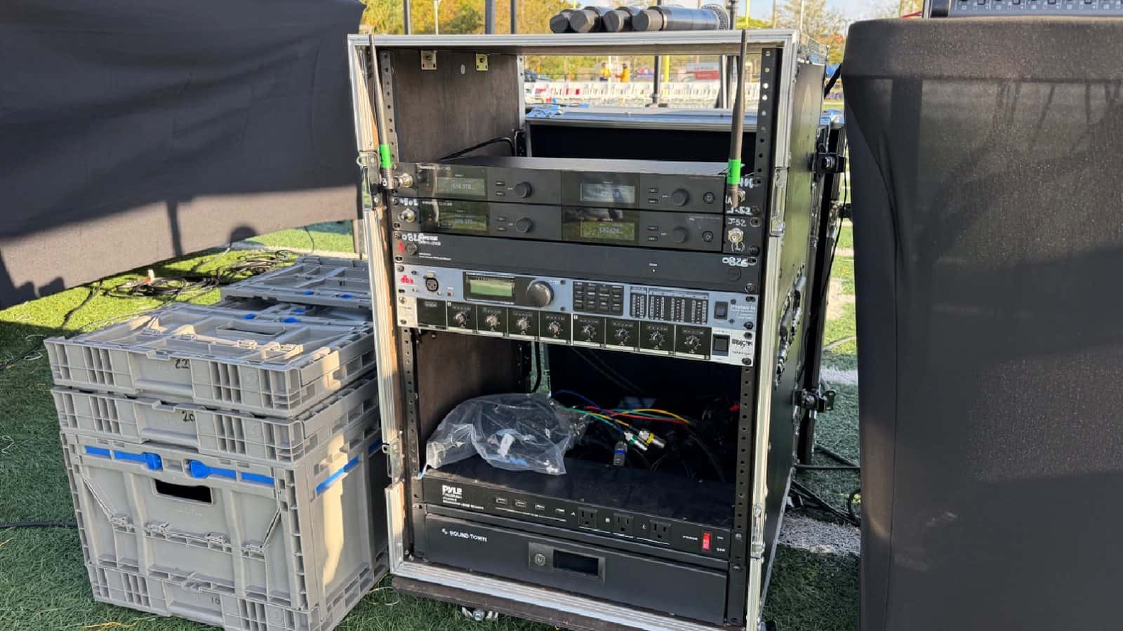 DBX audio processor centered in an outdoor production rack