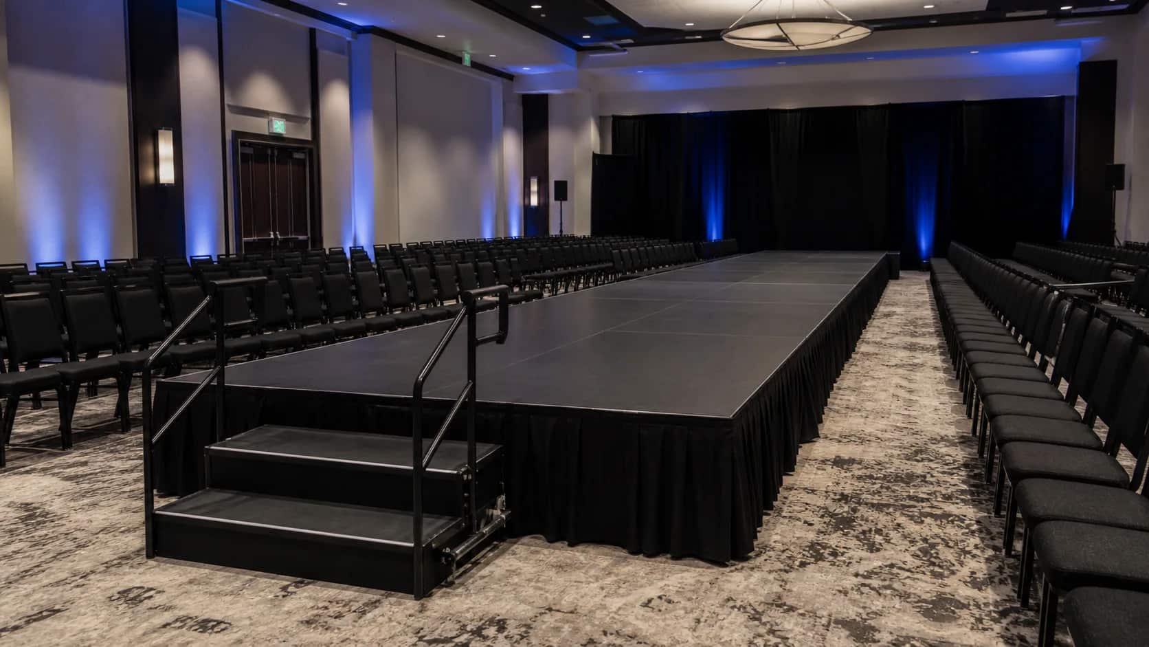 Modular stage platforms arranged at multiple heights for a custom layout