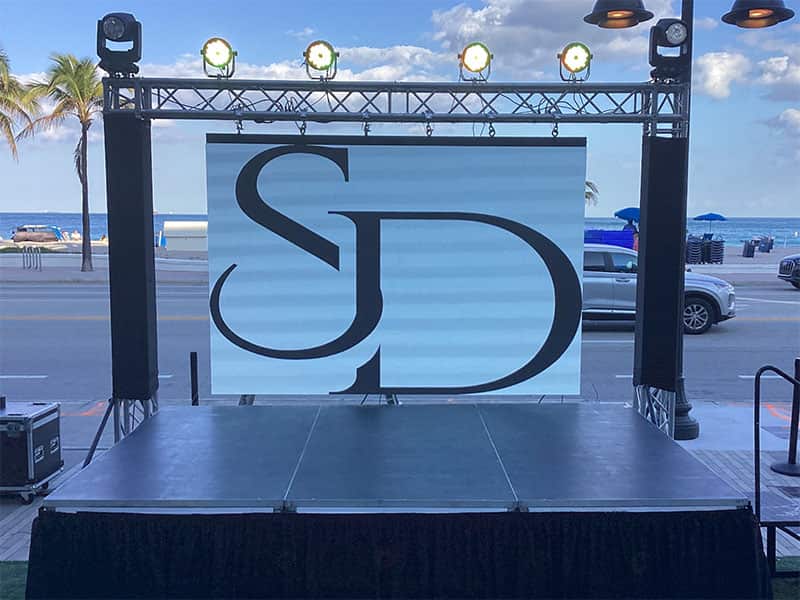 Portable modular stage assembled outdoors in South Florida