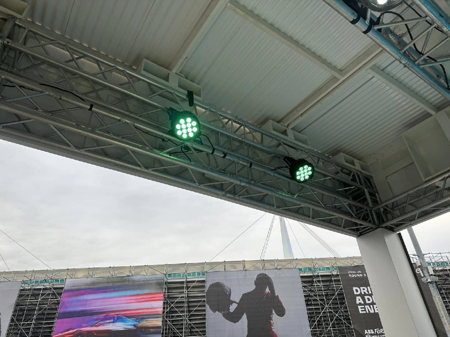 Two COLORdash PAR fixtures mounted on an event truss