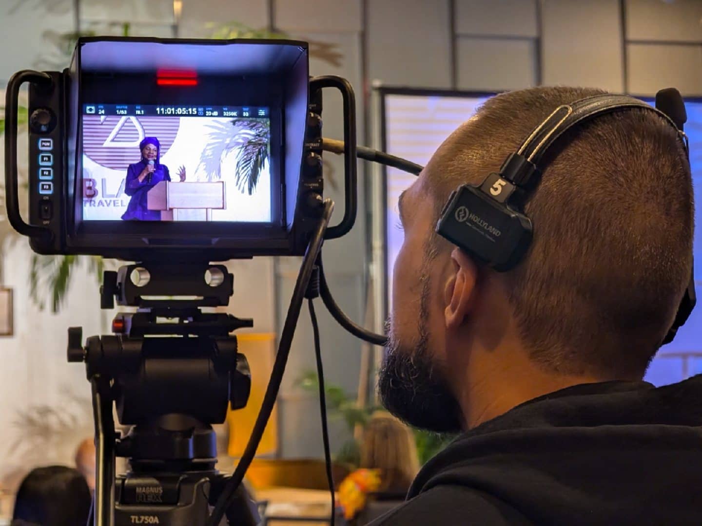 Operator working with the monitor on a studio camera