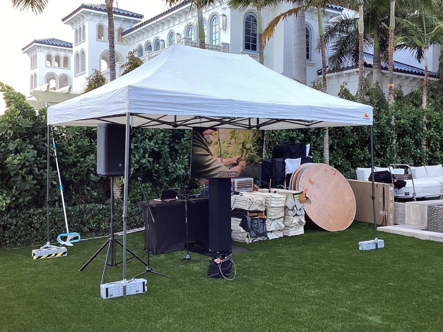 Open white event canopy with its full frame, roof, and footprint visible