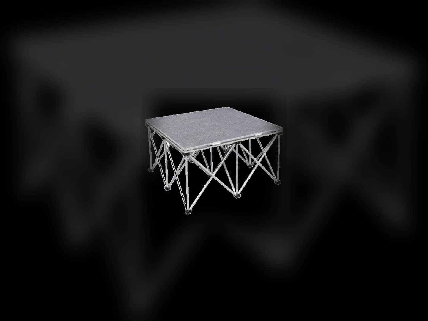 Gray carpeted four-by-four stage riser module on a truss-style base, shown as a separate Stage Risers product