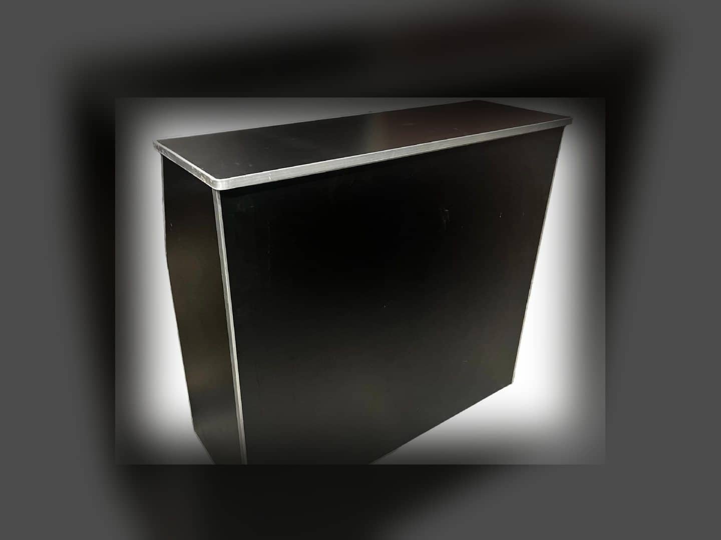 Portable bar front with black panels and silver trim