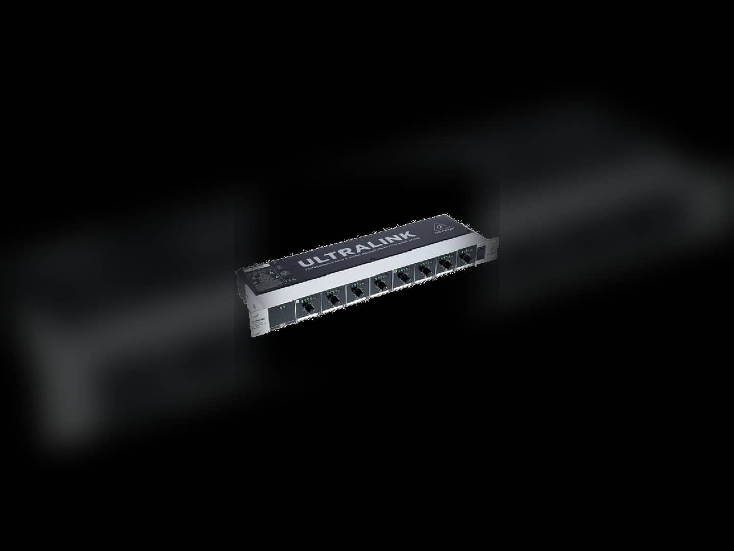 Behringer audio splitter with front-panel inputs and outputs visible
