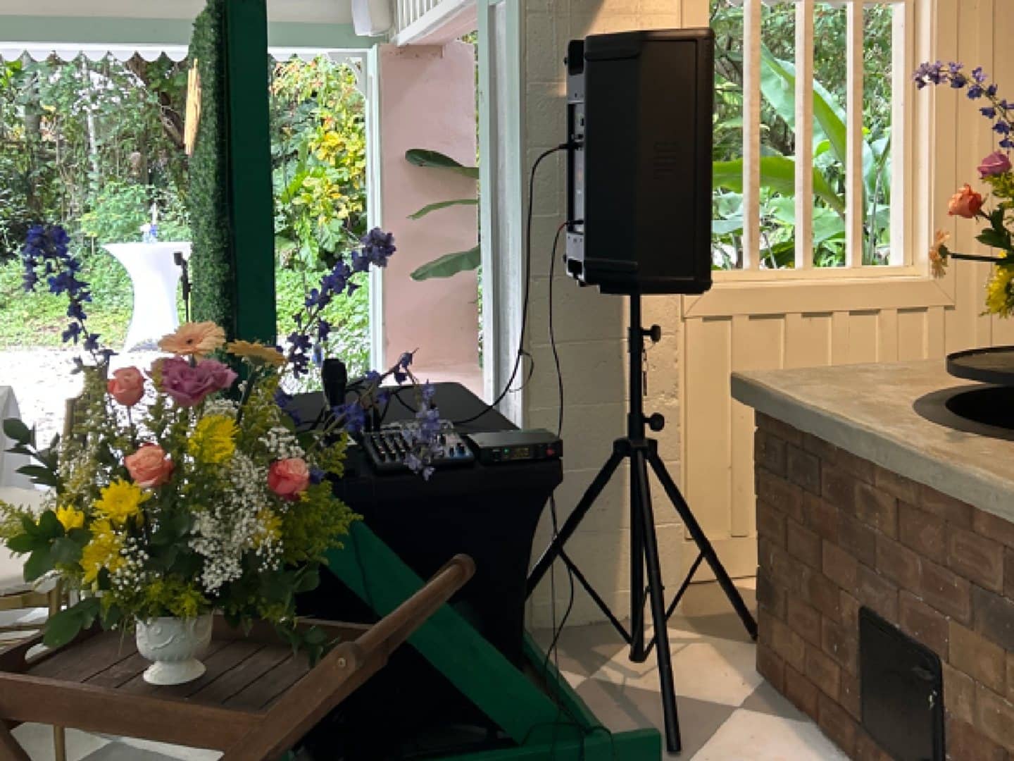Compact speaker, mixer, and wireless receiver setup for a small event