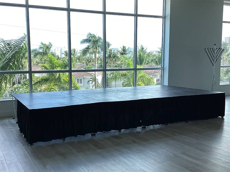 Finished modular stage platform prepared for an event