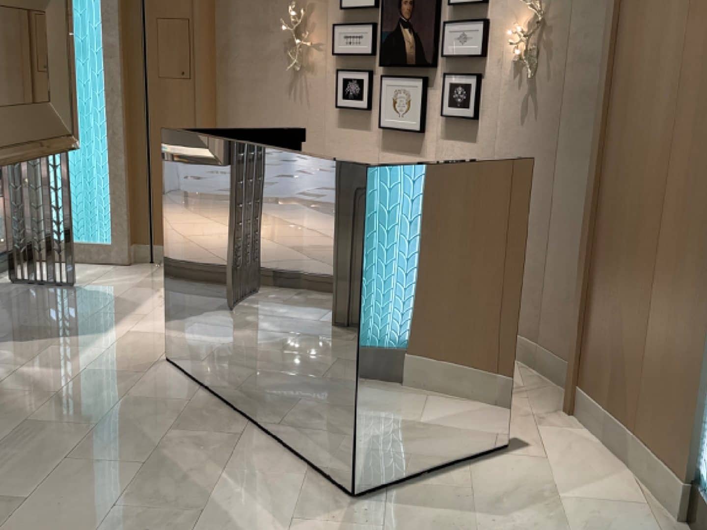 Mirror-finish DJ booth with reflective front and side panels