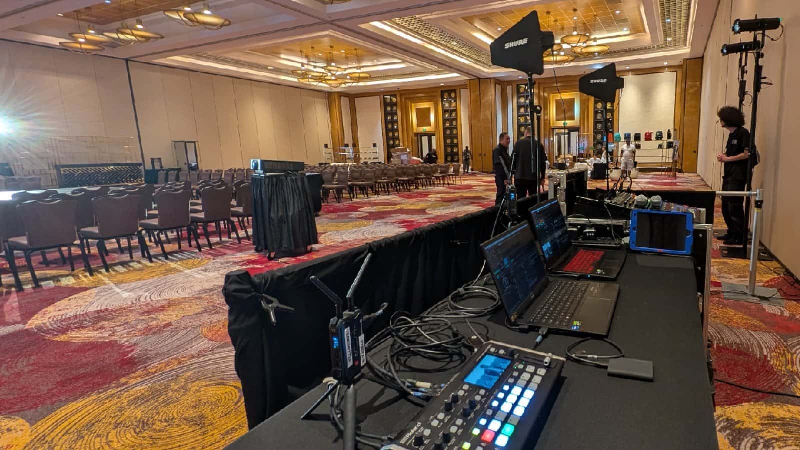 Video switching and laptop control position prepared in a conference ballroom