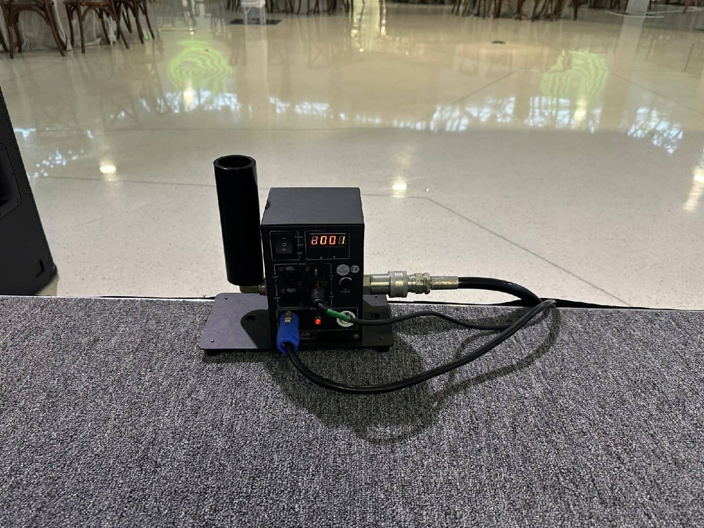 CO2 stage cannon connected to its hose and control cable